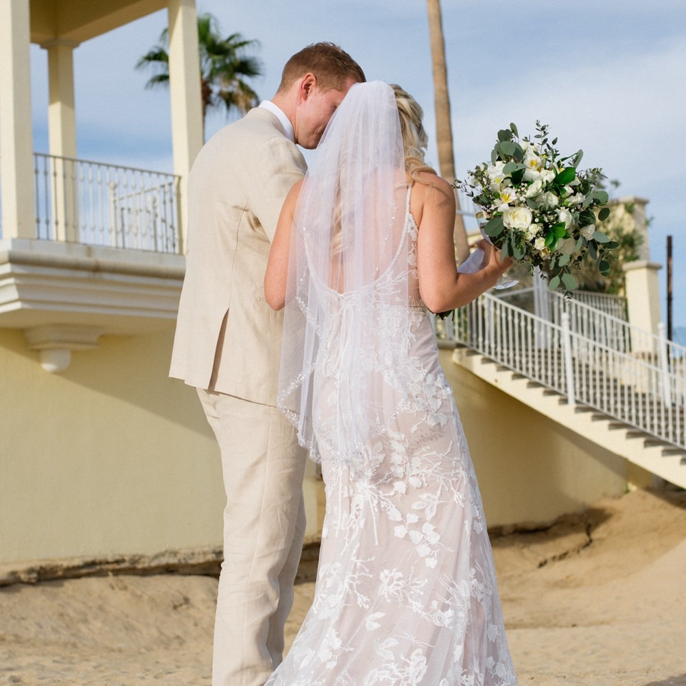 White chiffon veil with trim beading